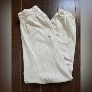 American Eagle cream sweatpants with flowers